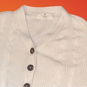 Promotion of three H&M women's sweaters